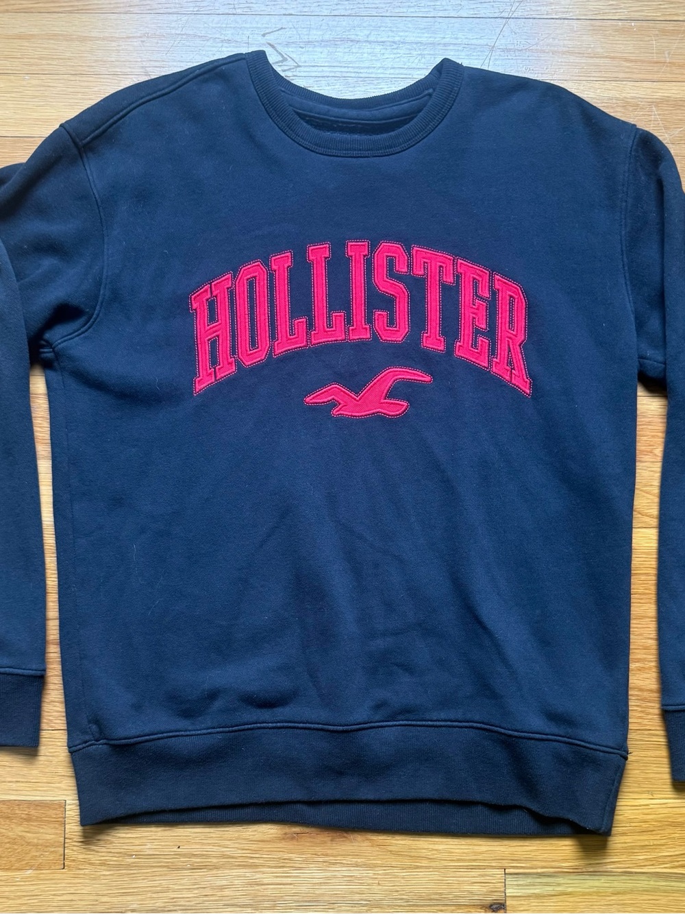 Hollister Men's Black Crewneck Sweatshirt with Red Logo